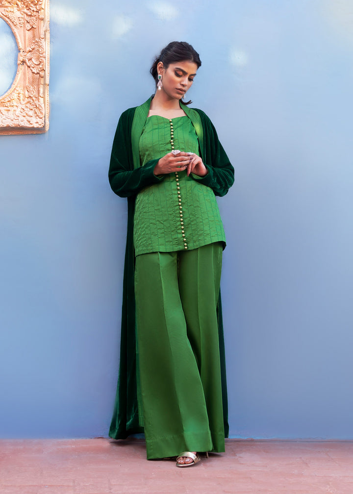 Model wearing green velevt jacket - image 5