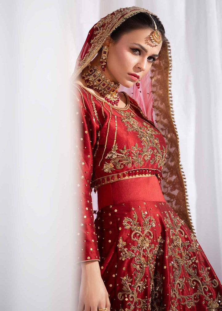 Model wearing Red and Gold Embellished Bridal Lehenga Choli Set - 4