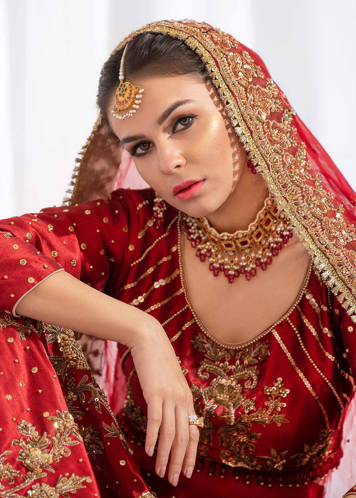 Model wearing Red and Gold Embellished Bridal Lehenga Choli Set - 6