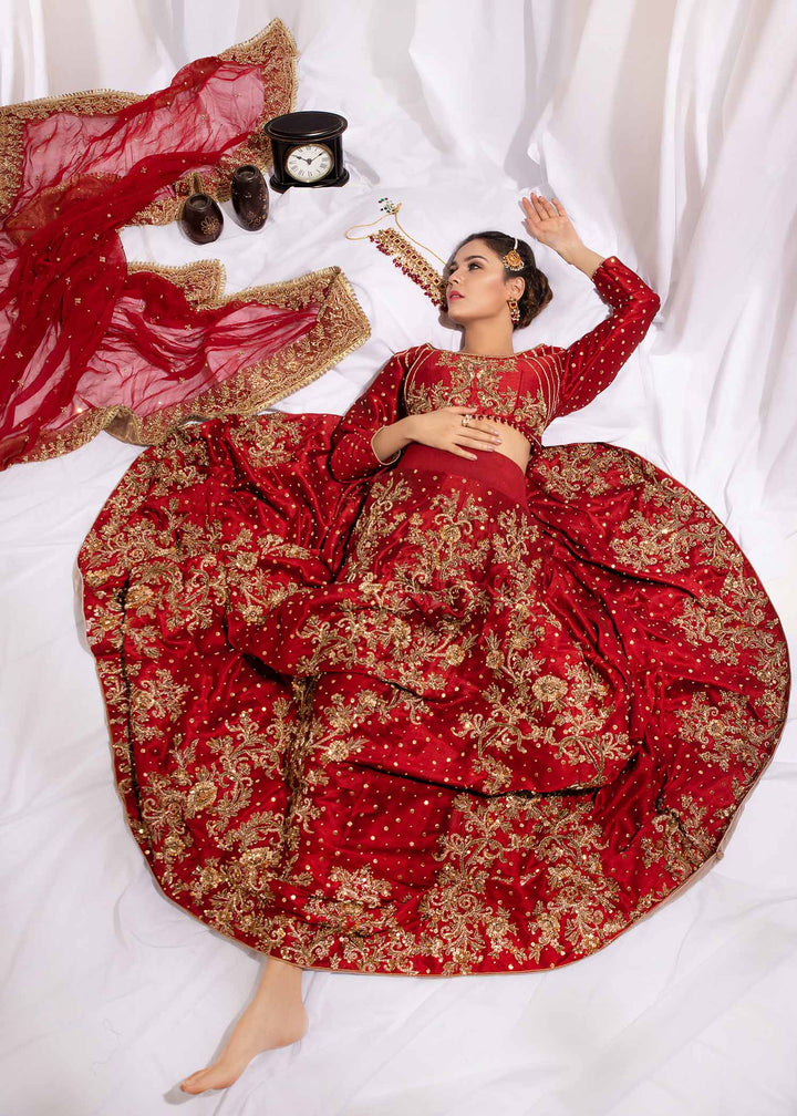 Model wearing Red and Gold Embellished Bridal Lehenga Choli Set - 9