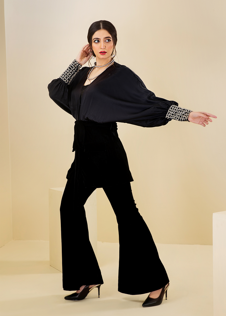 Model wearing black velvet flared sleeve coord set -4