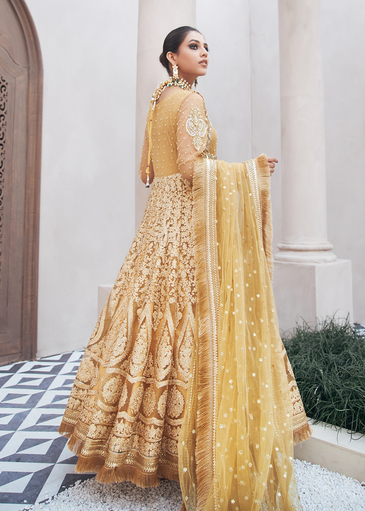 Model wearing Embroidered Gold flared Frock -5