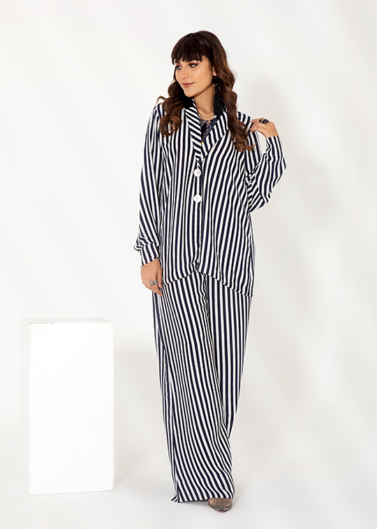 Model Wearing black and white stripped coord set - image 1