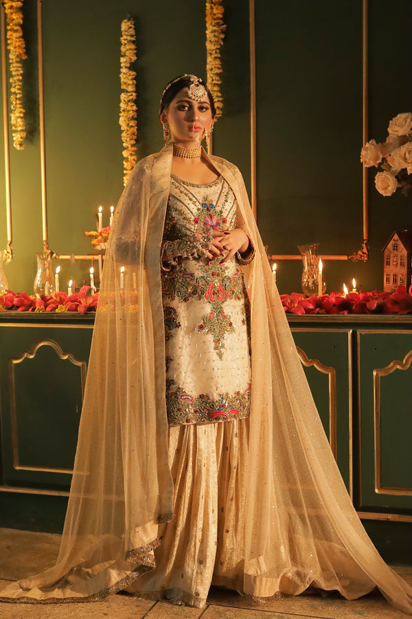 Model wearing A white flared gharara - frontal image