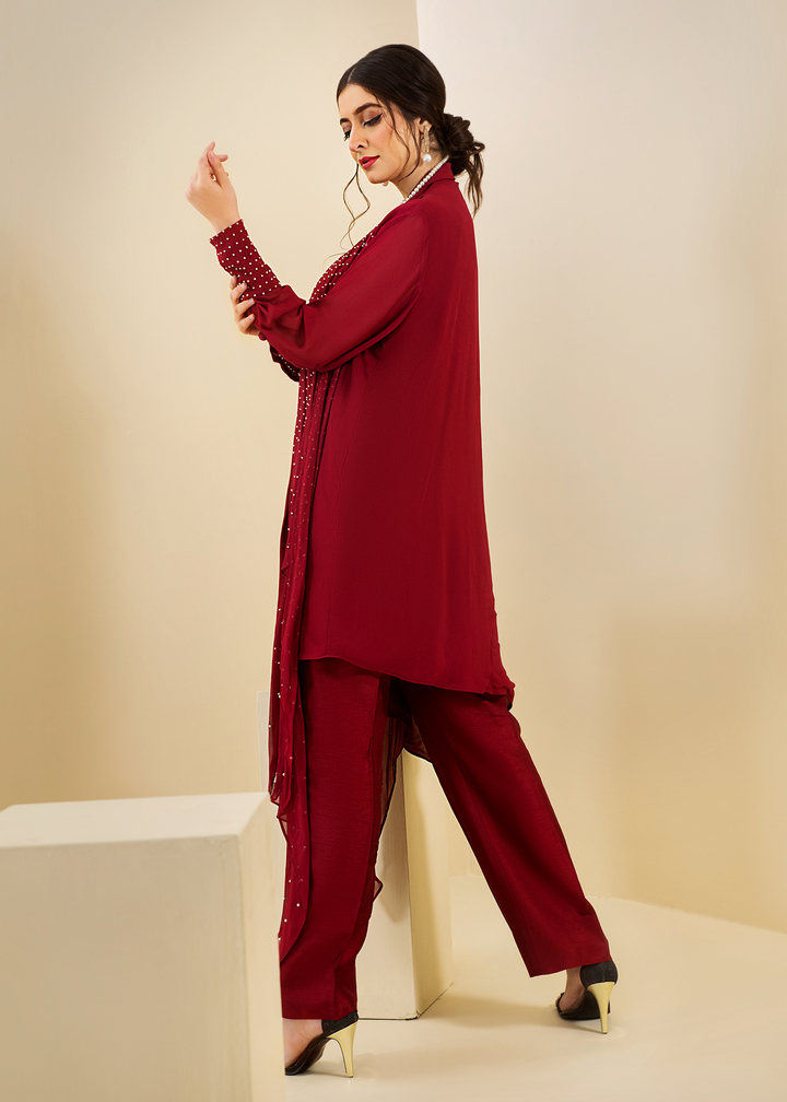 Model wearing red chiffon suit -4