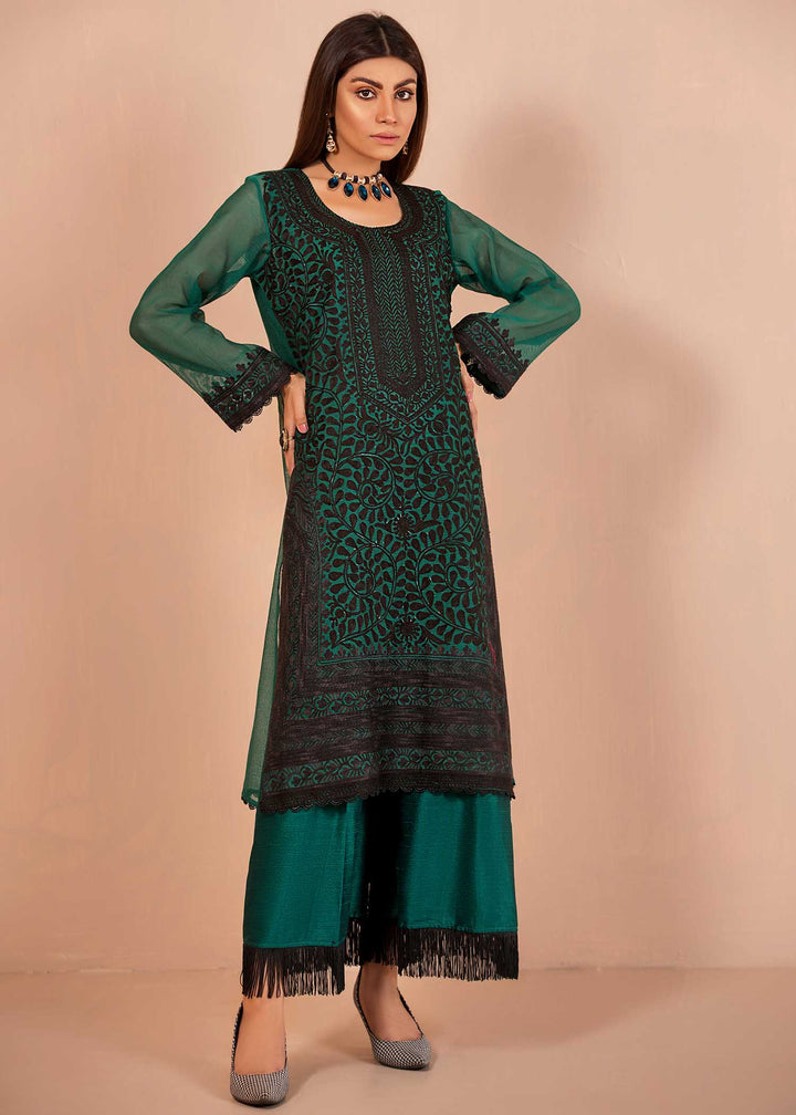 Model wearing Dark Green Kurta with Black Embroidery 