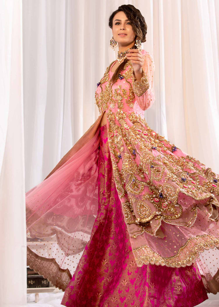 Model wearing Gold Embellished Pink Frock with Lehenga -3