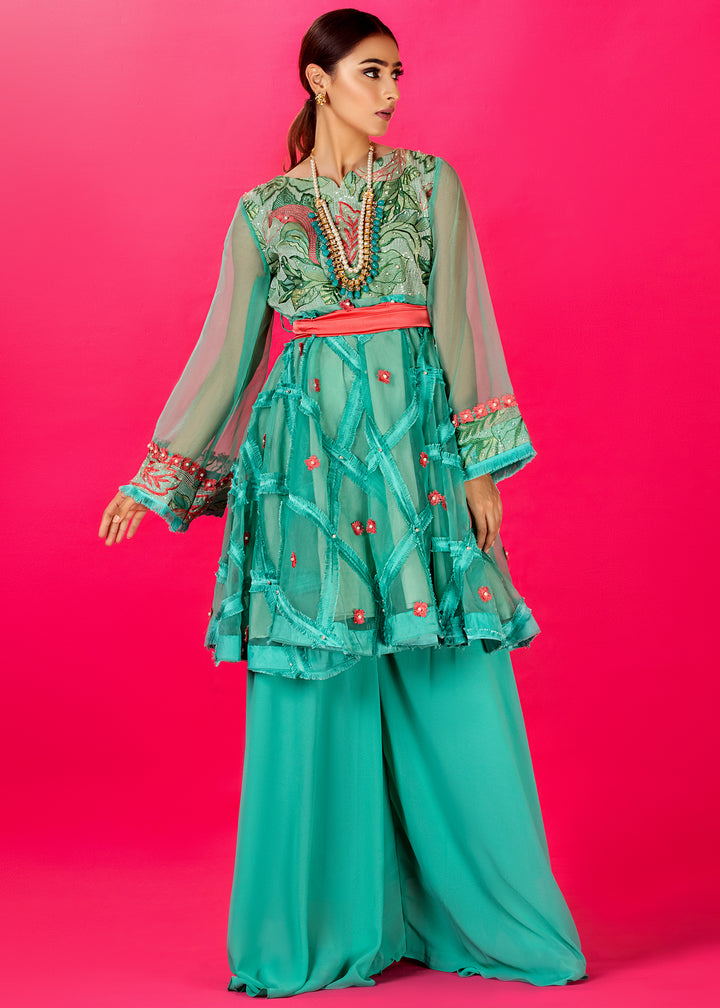 Model wearing Turquoise Peplum Shirt with Gharara Pants -1