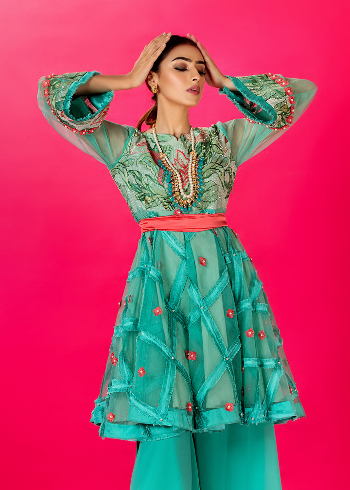 Model wearing Turquoise Peplum Shirt with Gharara Pants -3