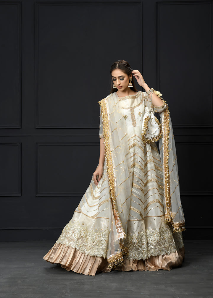 Model wearing White and Gold Frock with Lehenga -2