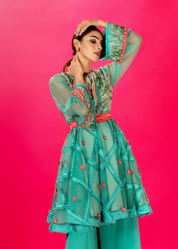 Model wearing Turquoise Peplum Shirt with Gharara Pants -4