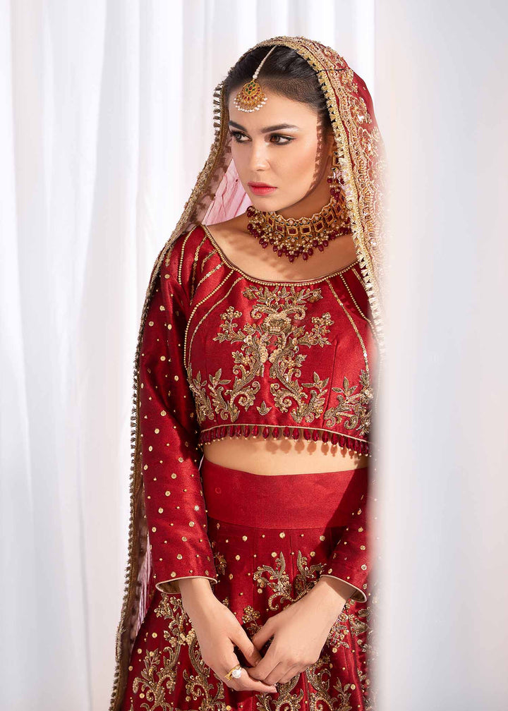 Model wearing Red and Gold Embellished Bridal Lehenga Choli Set - 2