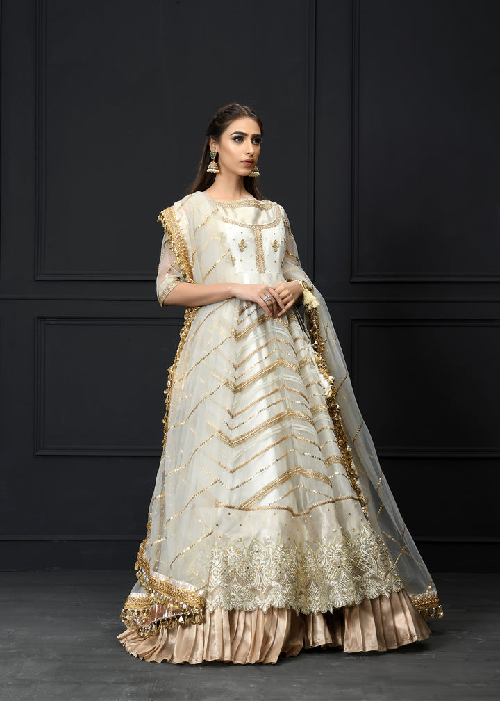 Model wearing White and Gold Frock with Lehenga -1