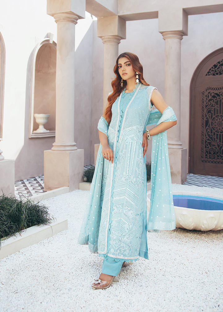 model wearing powder blue embroidered suit -2