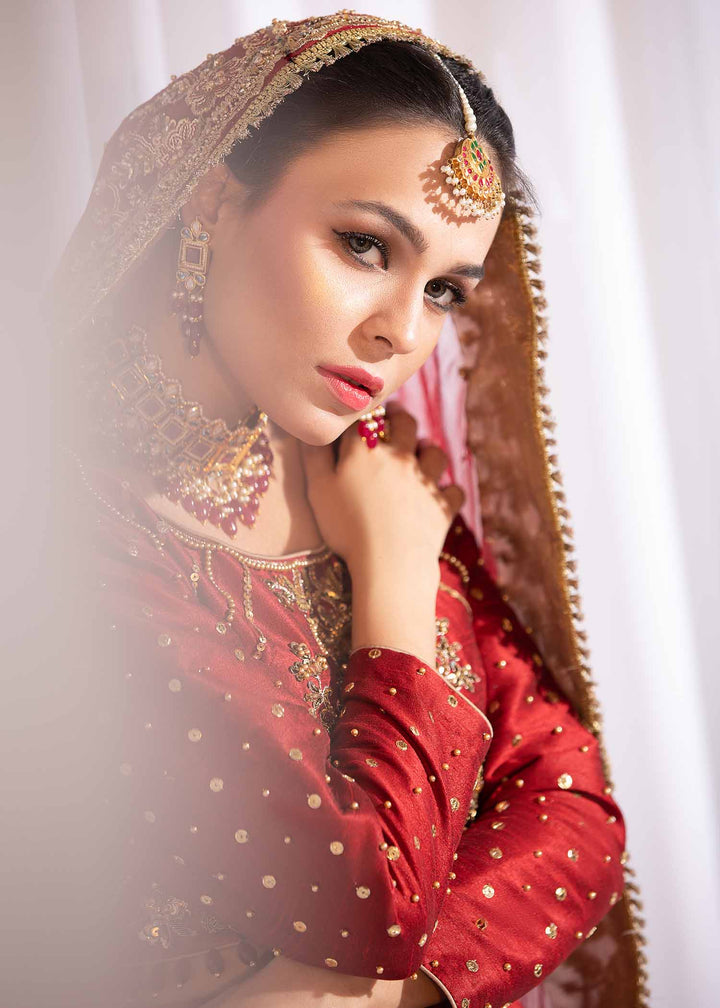 Model wearing Red and Gold Embellished Bridal Lehenga Choli Set - 5