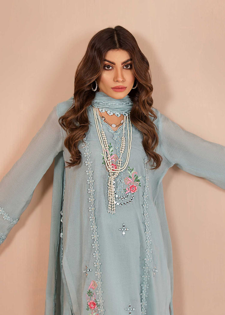 Model wearing blue suit with floral details -4