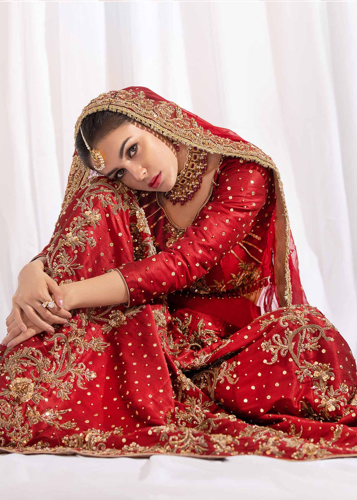 Model wearing Red and Gold Embellished Bridal Lehenga Choli Set - 7