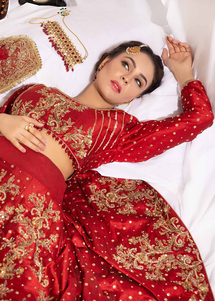 Model wearing Red and Gold Embellished Bridal Lehenga Choli Set - 8