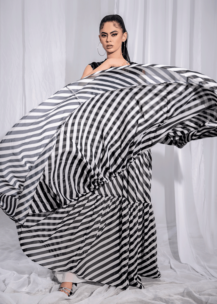 Model Wearing Stripe Lining Flared Gown - 4