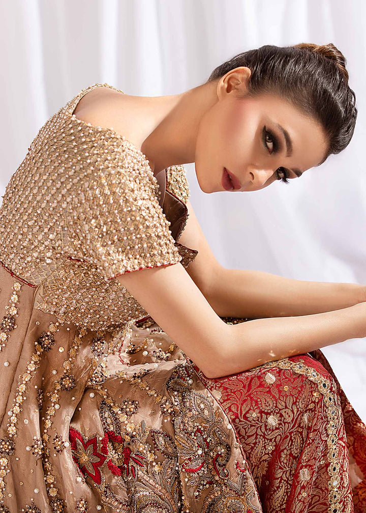Model wearing Gold Embellished Tail Frock with Red Lehenga -5
