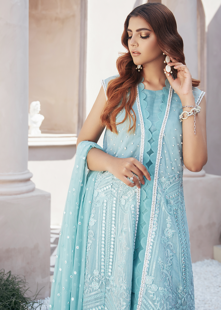 model wearing powder blue embroidered suit -4