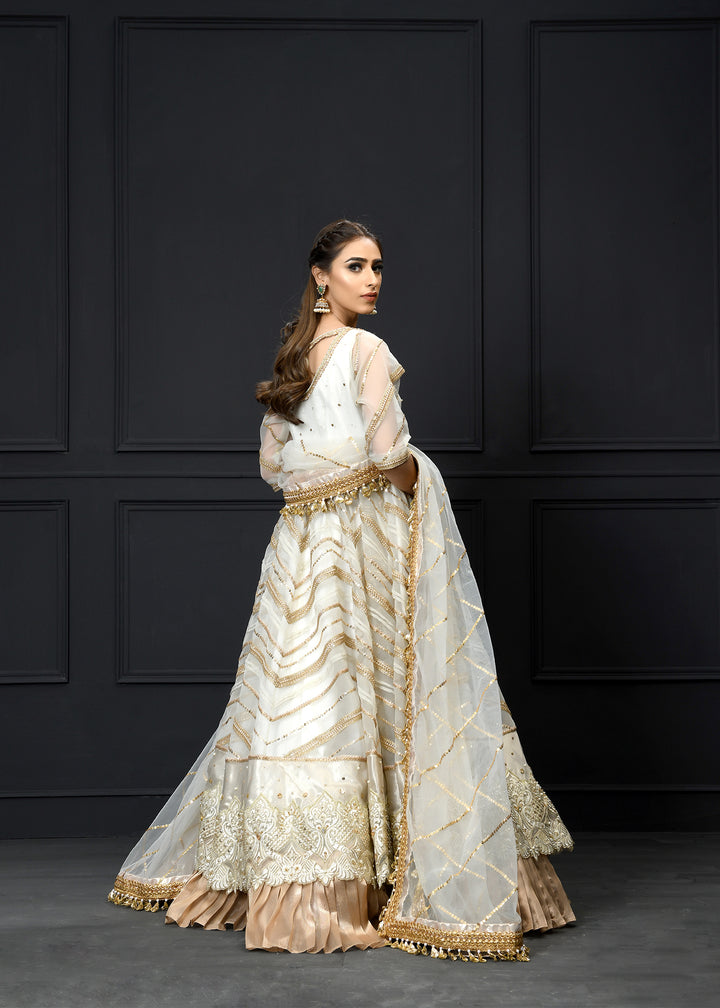 Model wearing White and Gold Frock with Lehenga -4