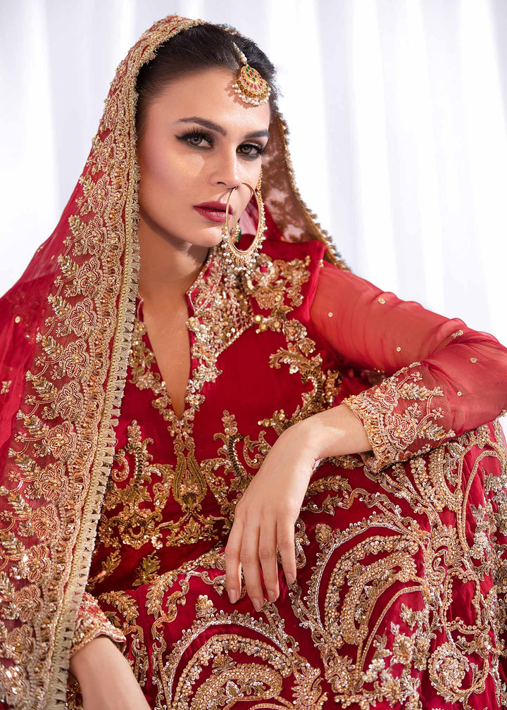 Model wearing Red and Gold Heavy Embellished Maxi Bridal Dress-3