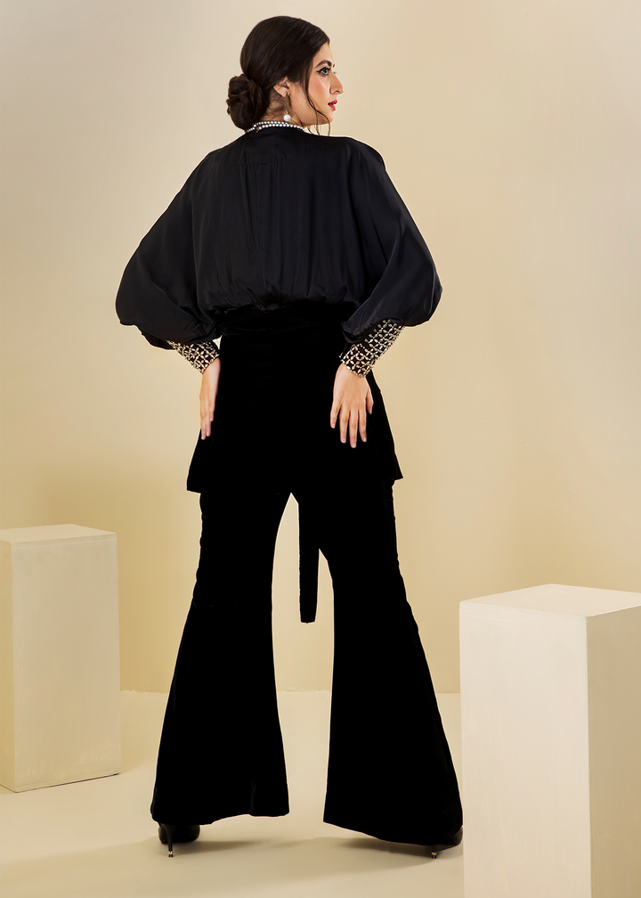 Model wearing black velvet flared sleeve coord set -5