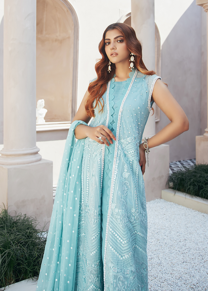 model wearing powder blue embroidered suit -5