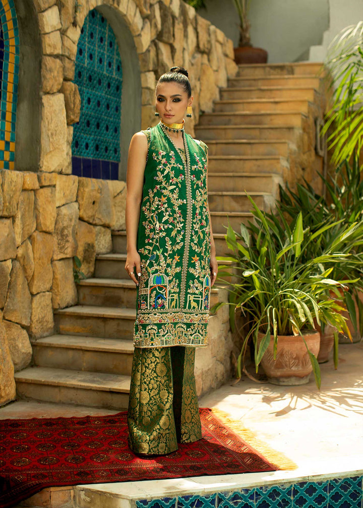 Model wearing spring green Mughal print suit-1