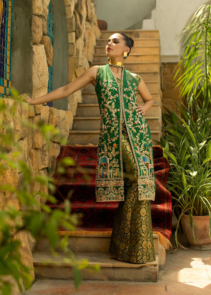 Model wearing spring green Mughal print suit-2
