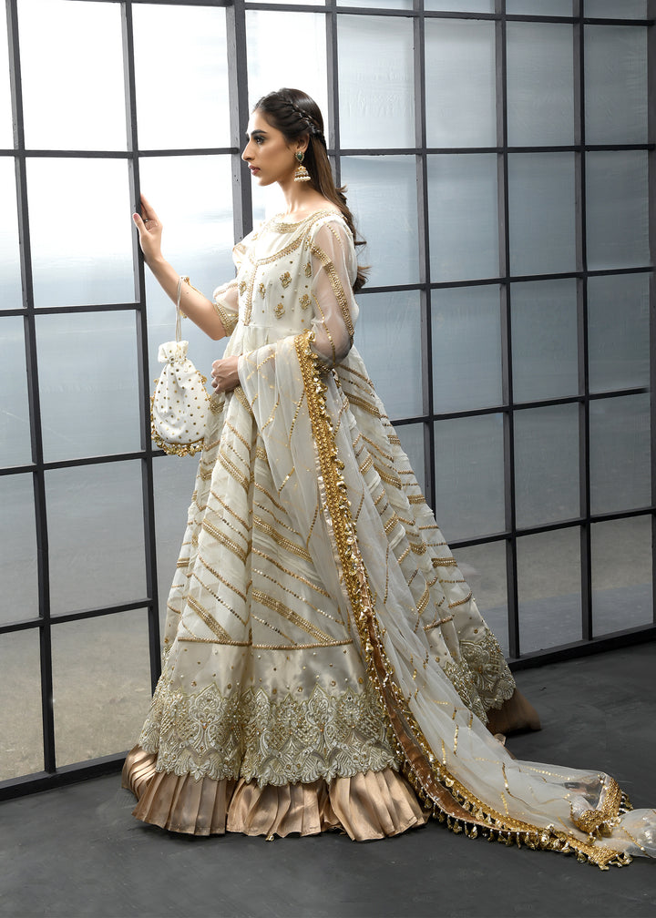 Model wearing White and Gold Frock with Lehenga -7
